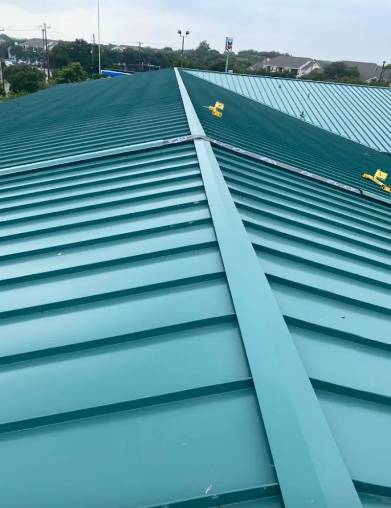 Green commercial metal roof ridge and valley for Metal Roof Repair in Cave Creek